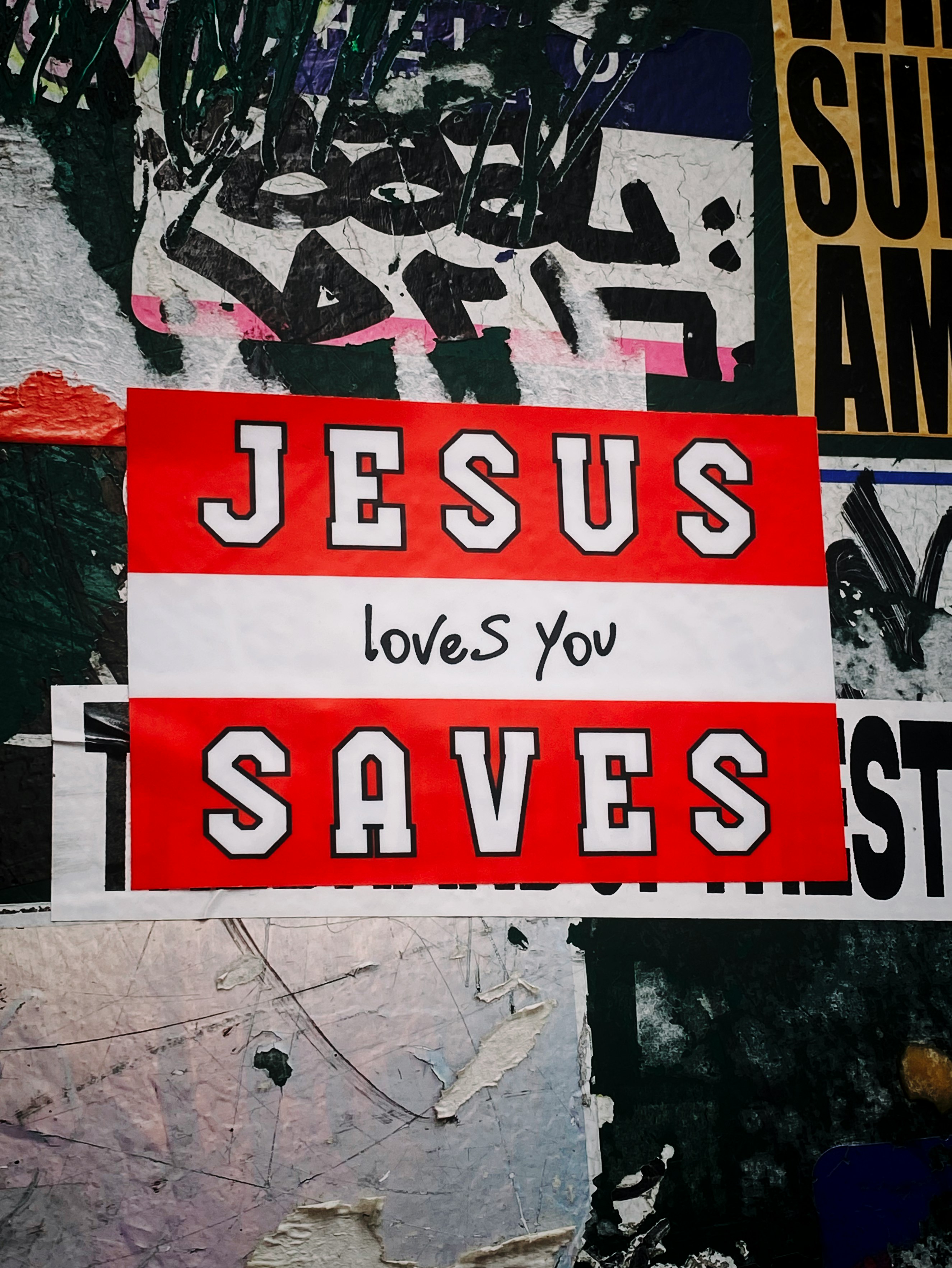 red and white Jesus Love You Saves artwork